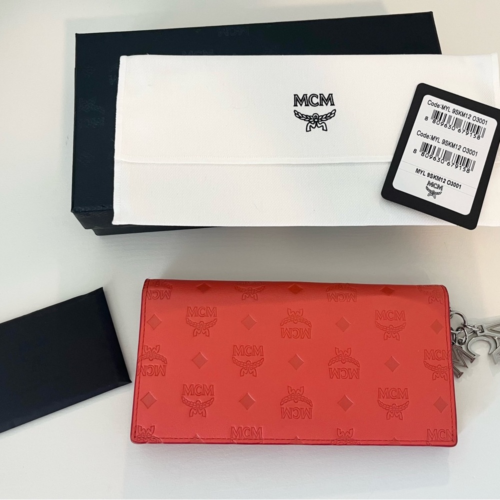 Authentic MCM Embossed Two-Fold Wallet